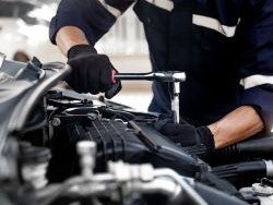 Ford Diesel Technician Servicing Engine